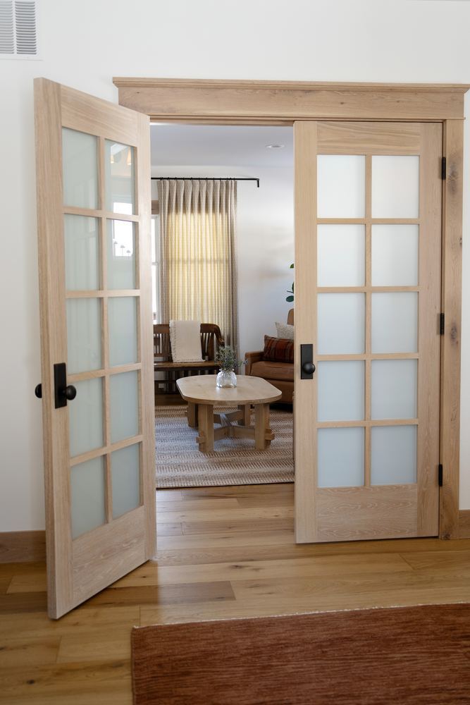 Glazed oak doors to the sitting room