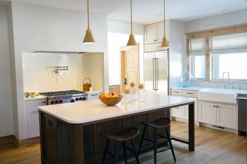 Walnut island, painted perimeter, brass pendants