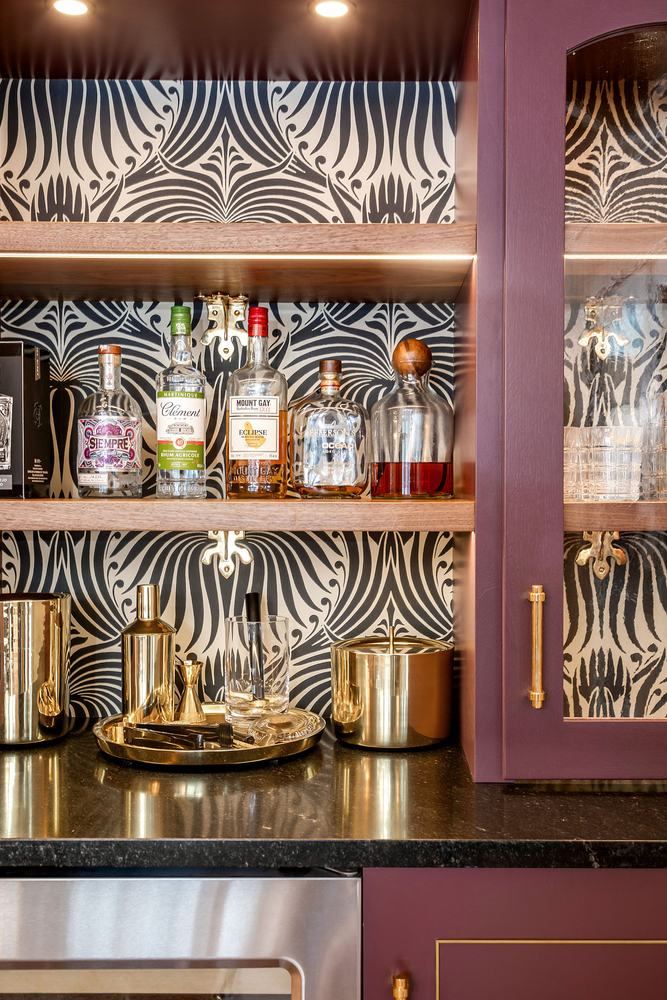 Bar detail, zebra wallpaper and brass