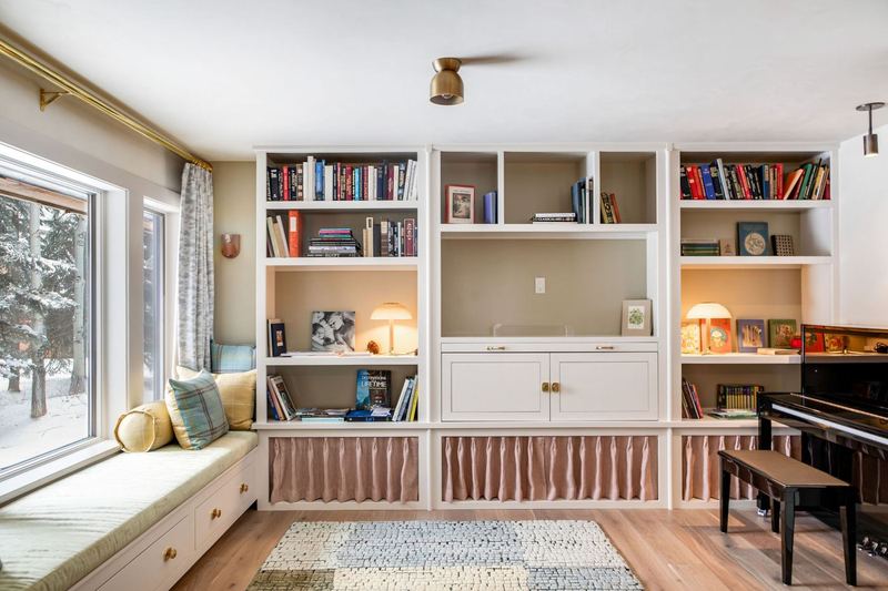 Window seat and library wall, painted millwork