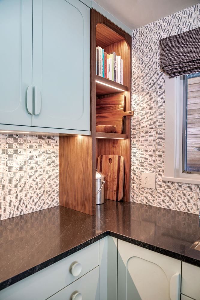 Walnut pantry shelving, glazed tile