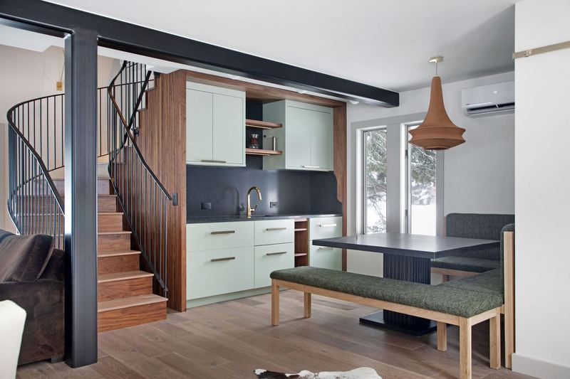 Kitchen and curved stair in a Tormey renovation